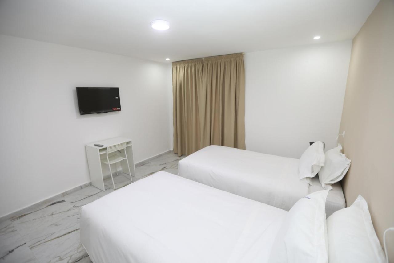 Mji Group Hotel ตันตัน ภายนอก รูปภาพ